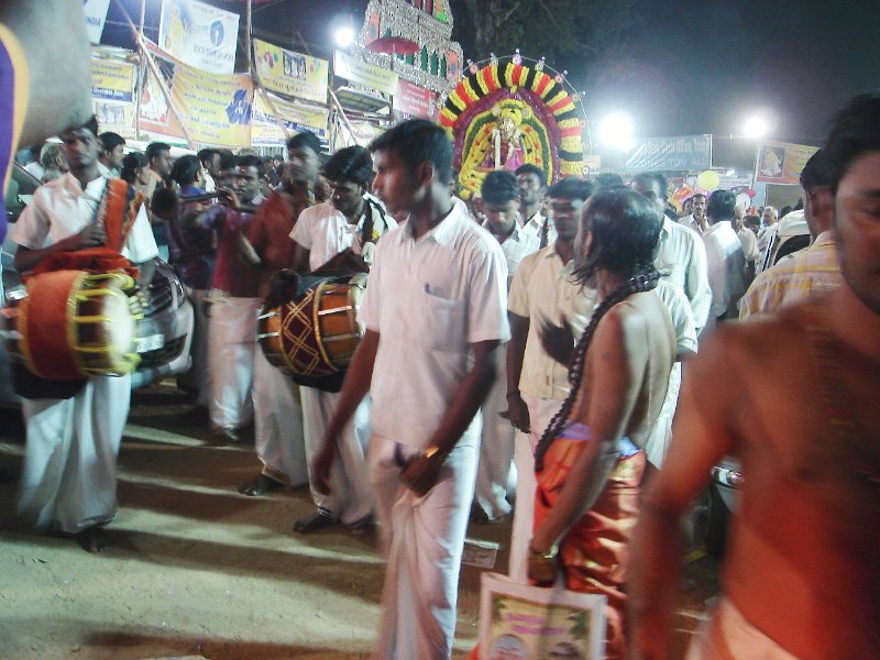 DSC03335.JPG - A procession of the image of Thiagaraja winds through the campus for a veedhi ula on aradhana evening